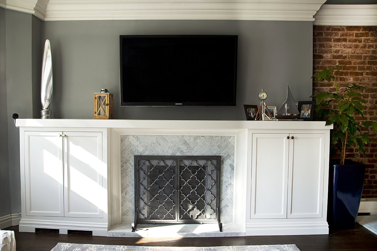 Cobble Hill project hallway with paneled wainscoting, crown moulding and framed artwork — image 3 of 7