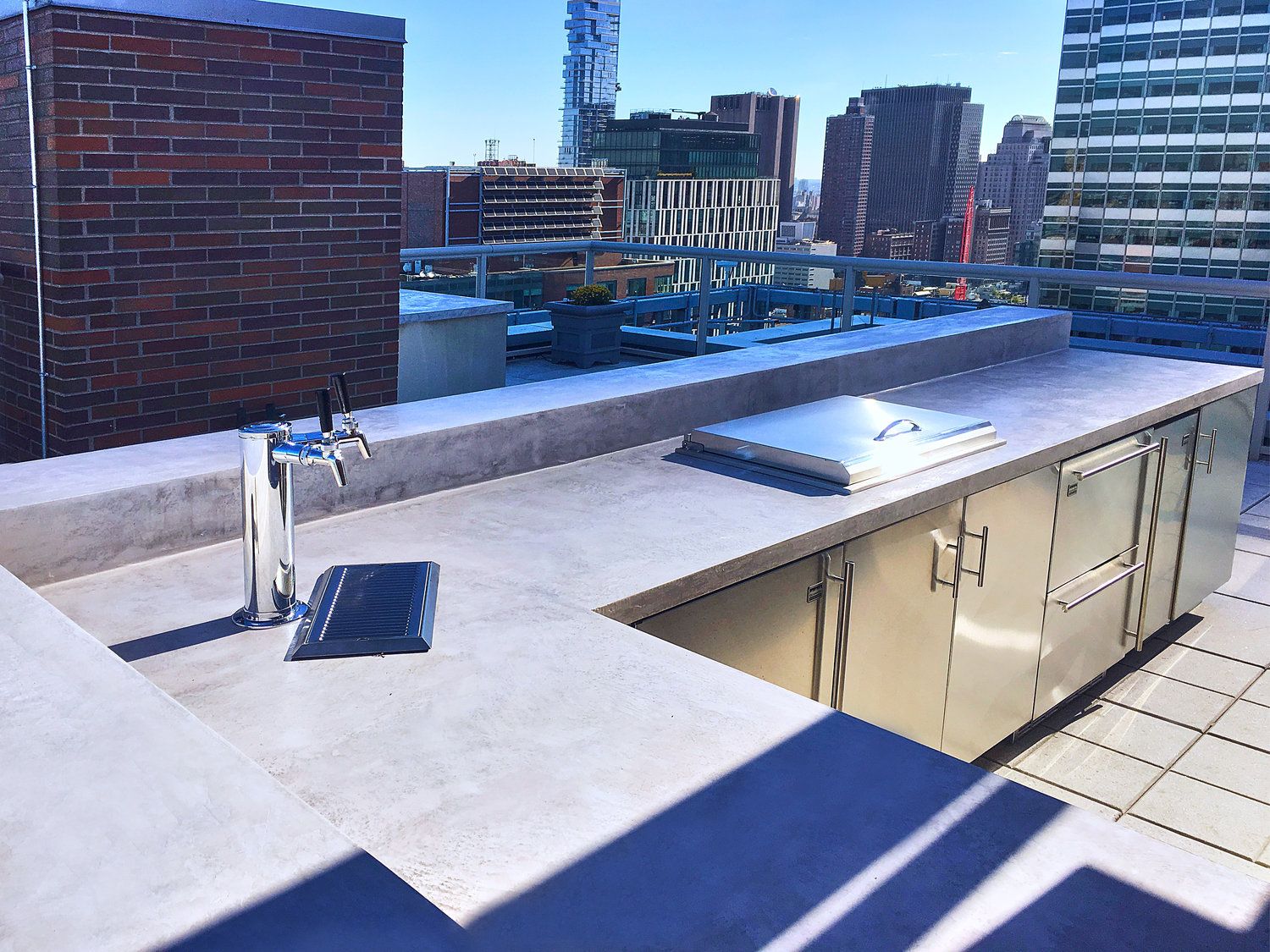 Battery Park City rooftop terrace with built-in seating and city views — image 2 of 6