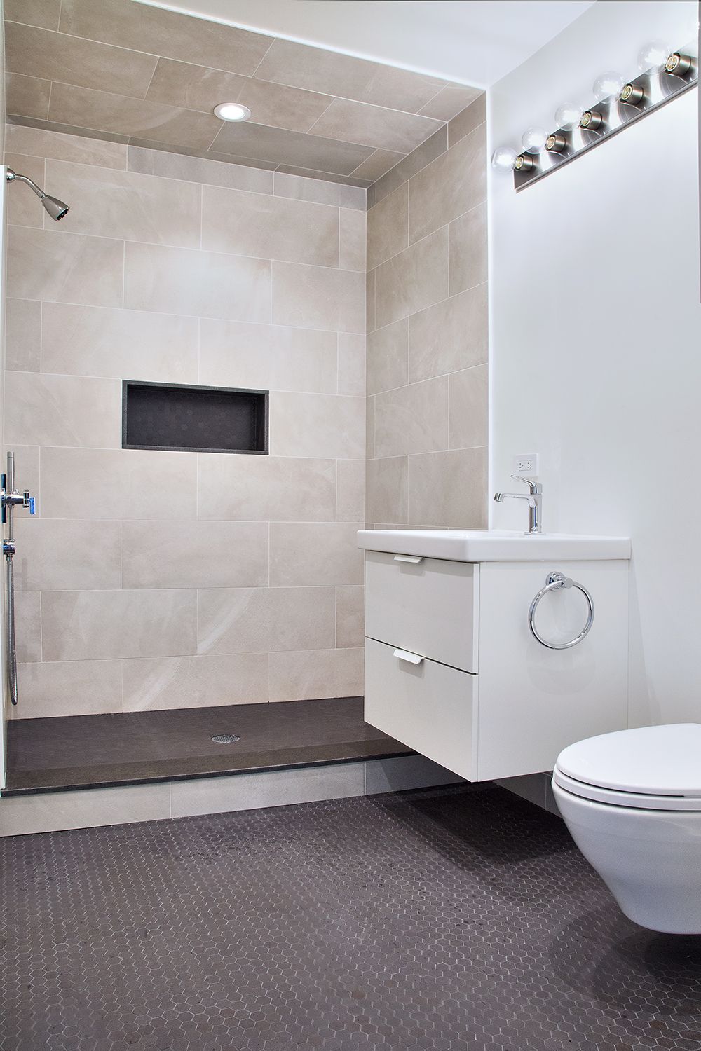 Flatiron District apartment renovation with custom cabinetry and stone surfaces — image 9 of 10