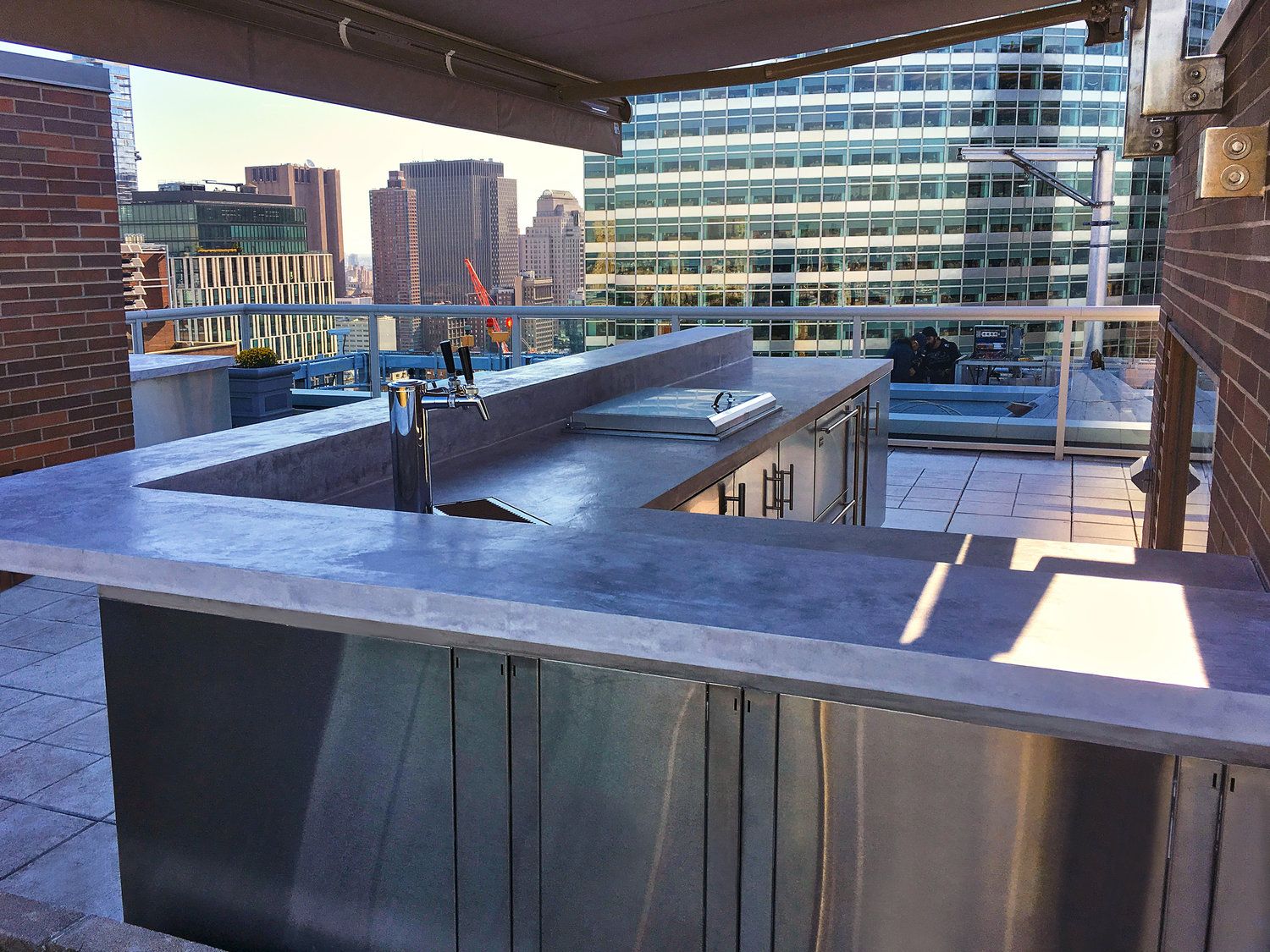 Battery Park City rooftop terrace with built-in seating and city views — image 5 of 6