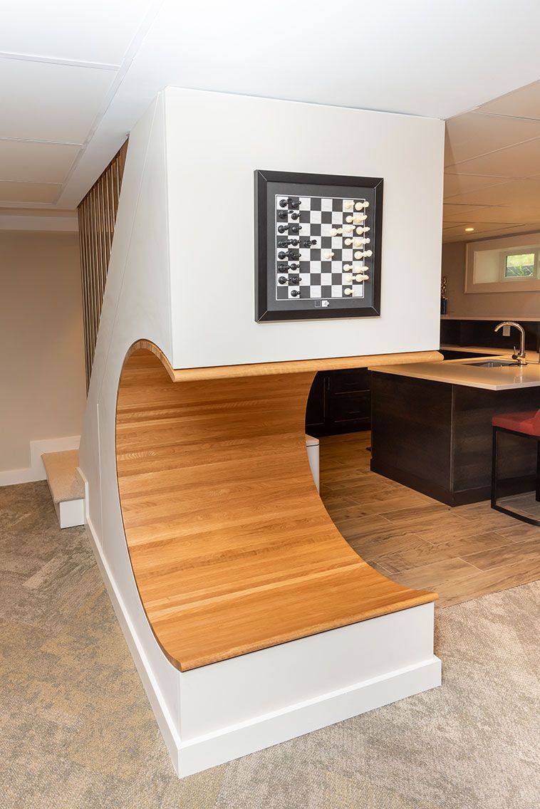 Cedar Lane residence in Rhinebeck, New York with warm wood and stone finishes — image 5 of 10