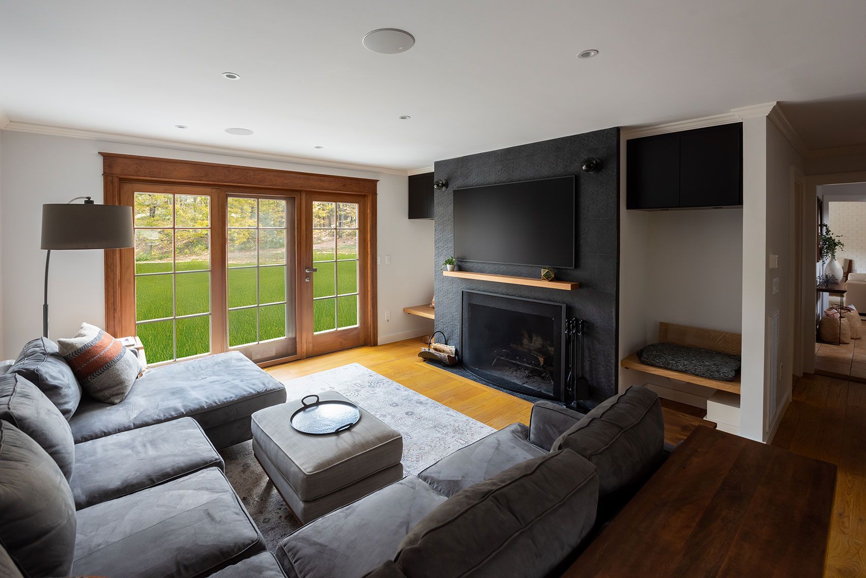 Cedar Lane residence in Rhinebeck, New York with warm wood and stone finishes — image 4 of 10