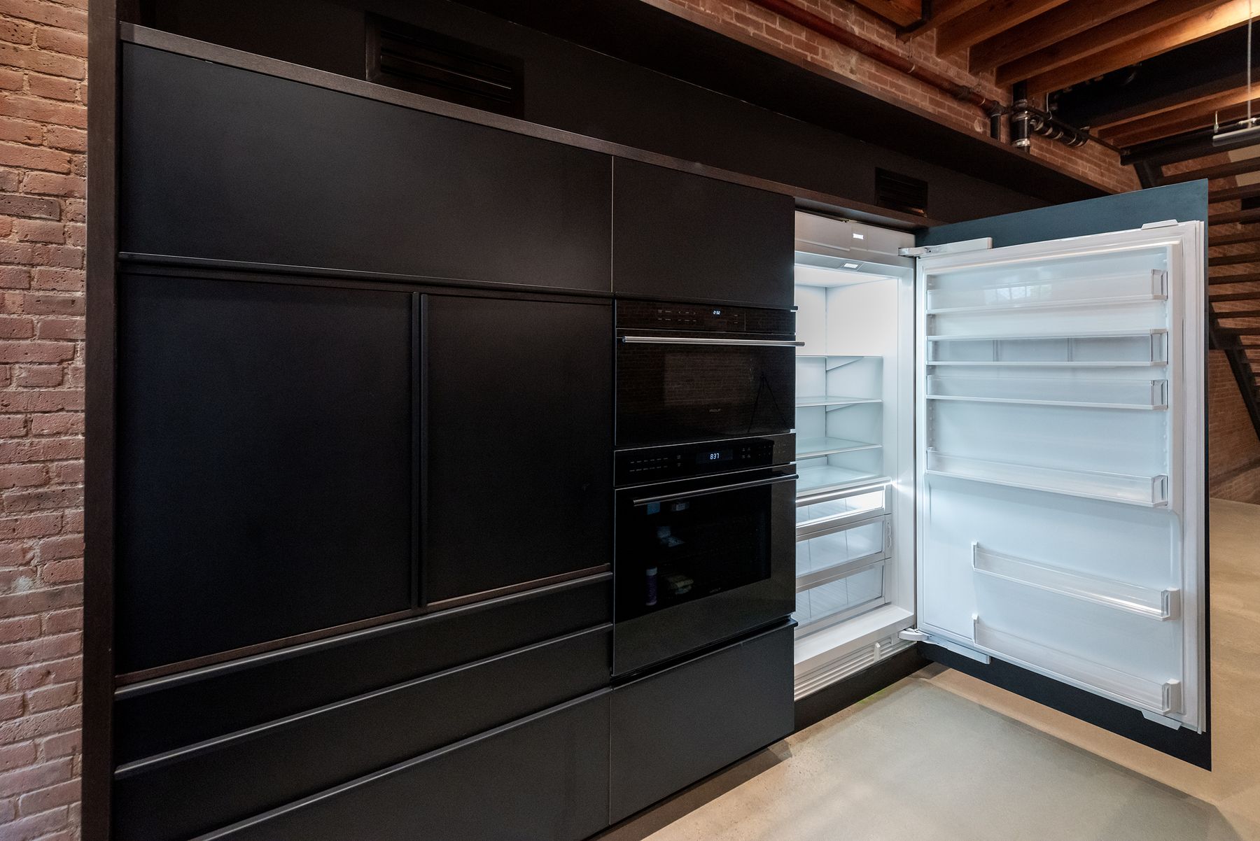 West SoHo loft renovation with open living spaces and bespoke detailing — image 8 of 10