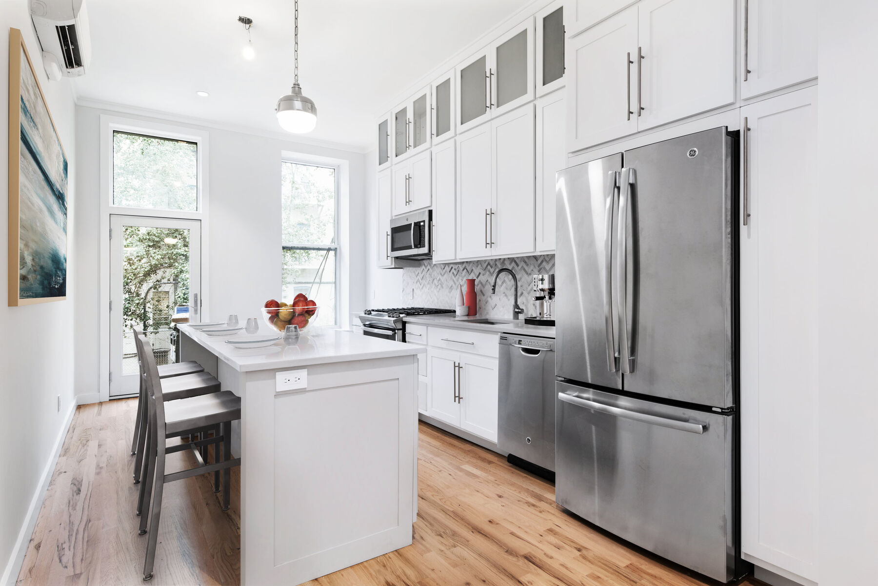 Harlem residence renovation with open living and dining rooms and custom joinery — image 2 of 13