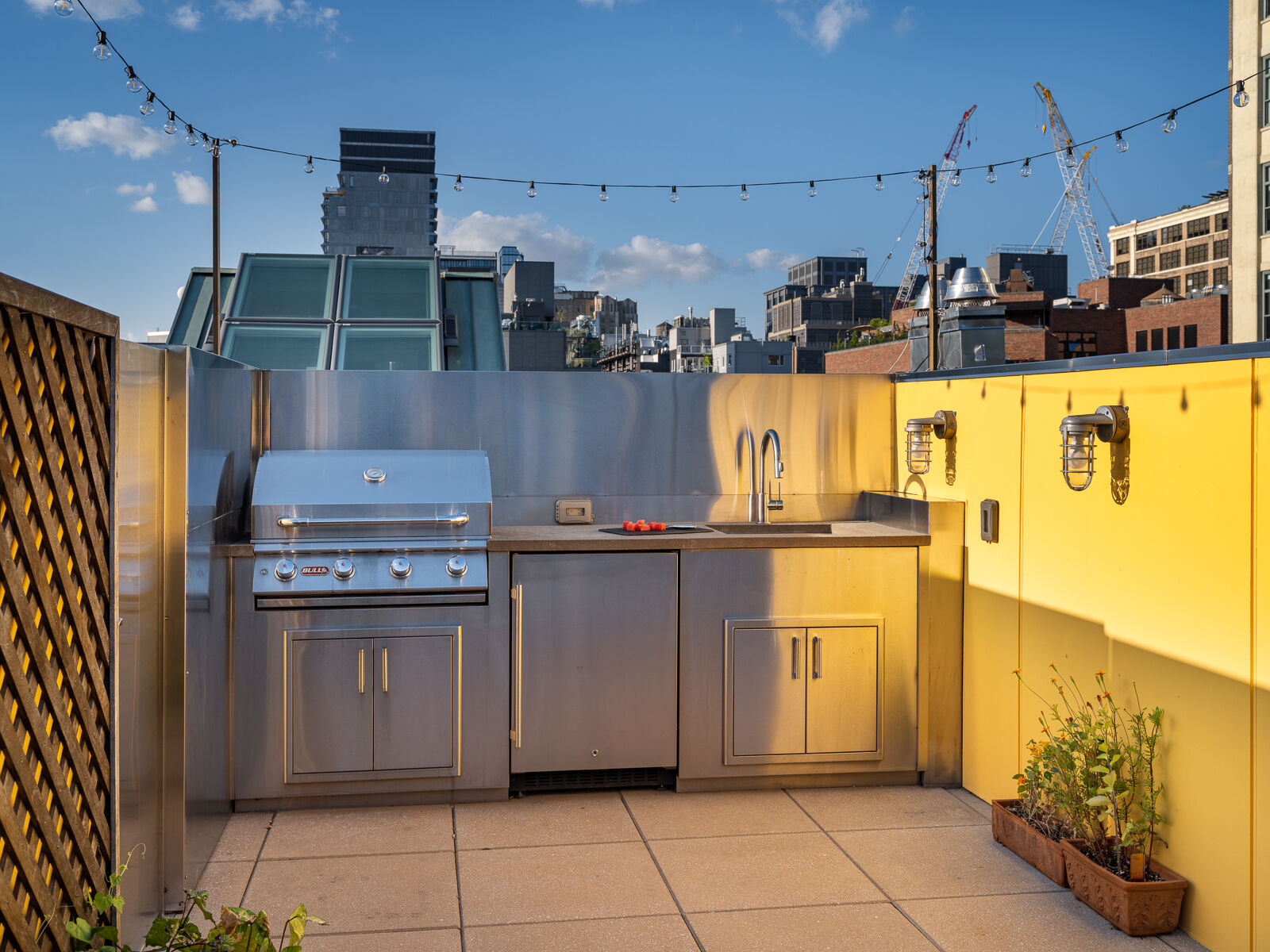 Tribeca rooftop terrace with built-in seating and skyline views