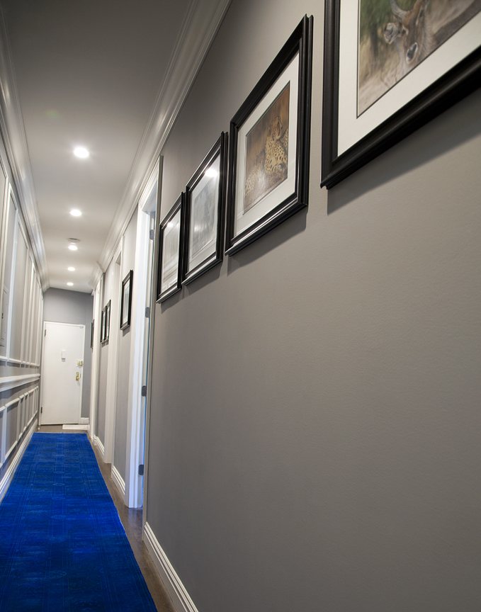 Cobble Hill project hallway with paneled wainscoting, crown moulding and framed artwork — image 7 of 7