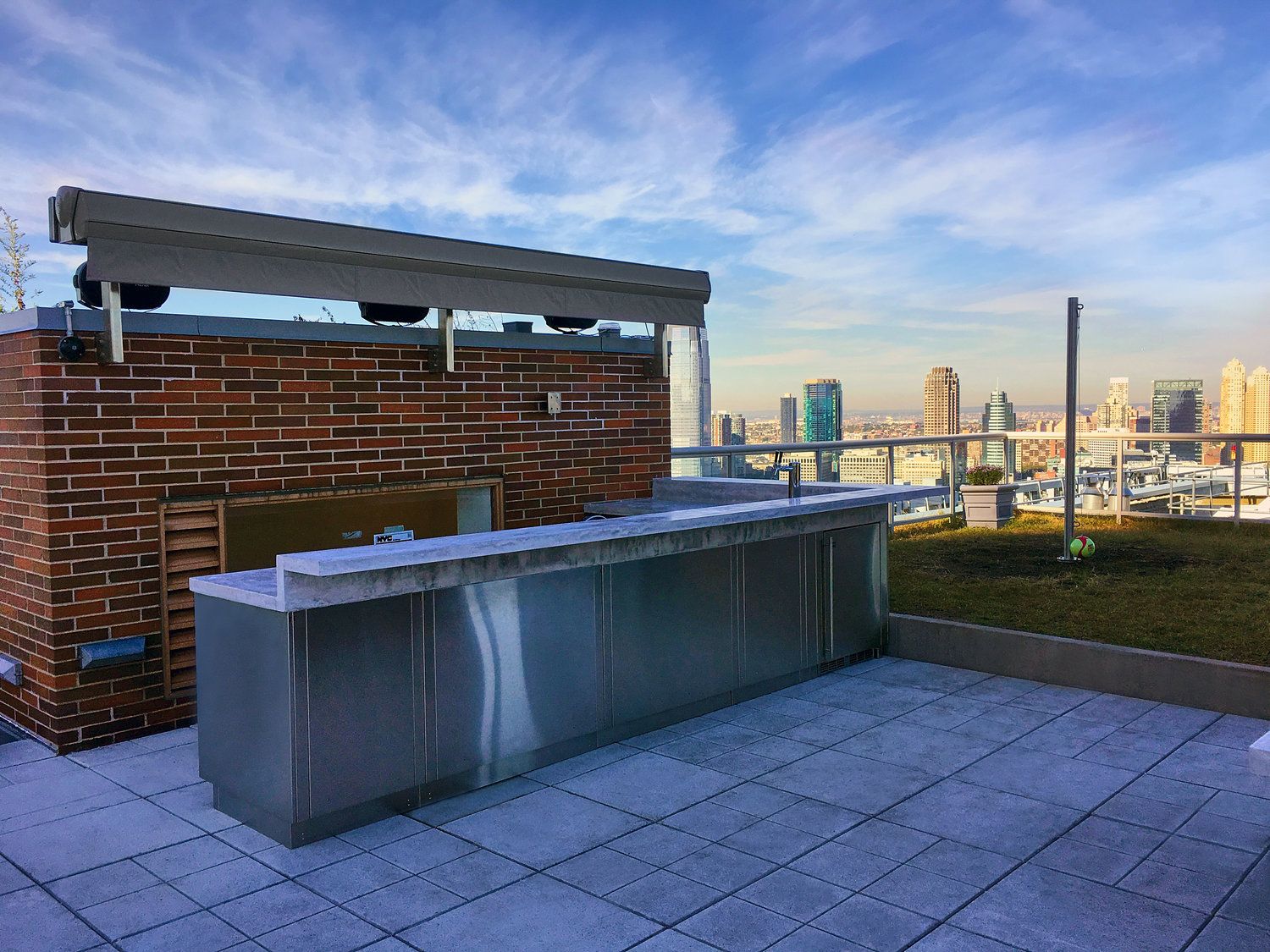 Battery Park City rooftop terrace with built-in seating and city views — image 4 of 6