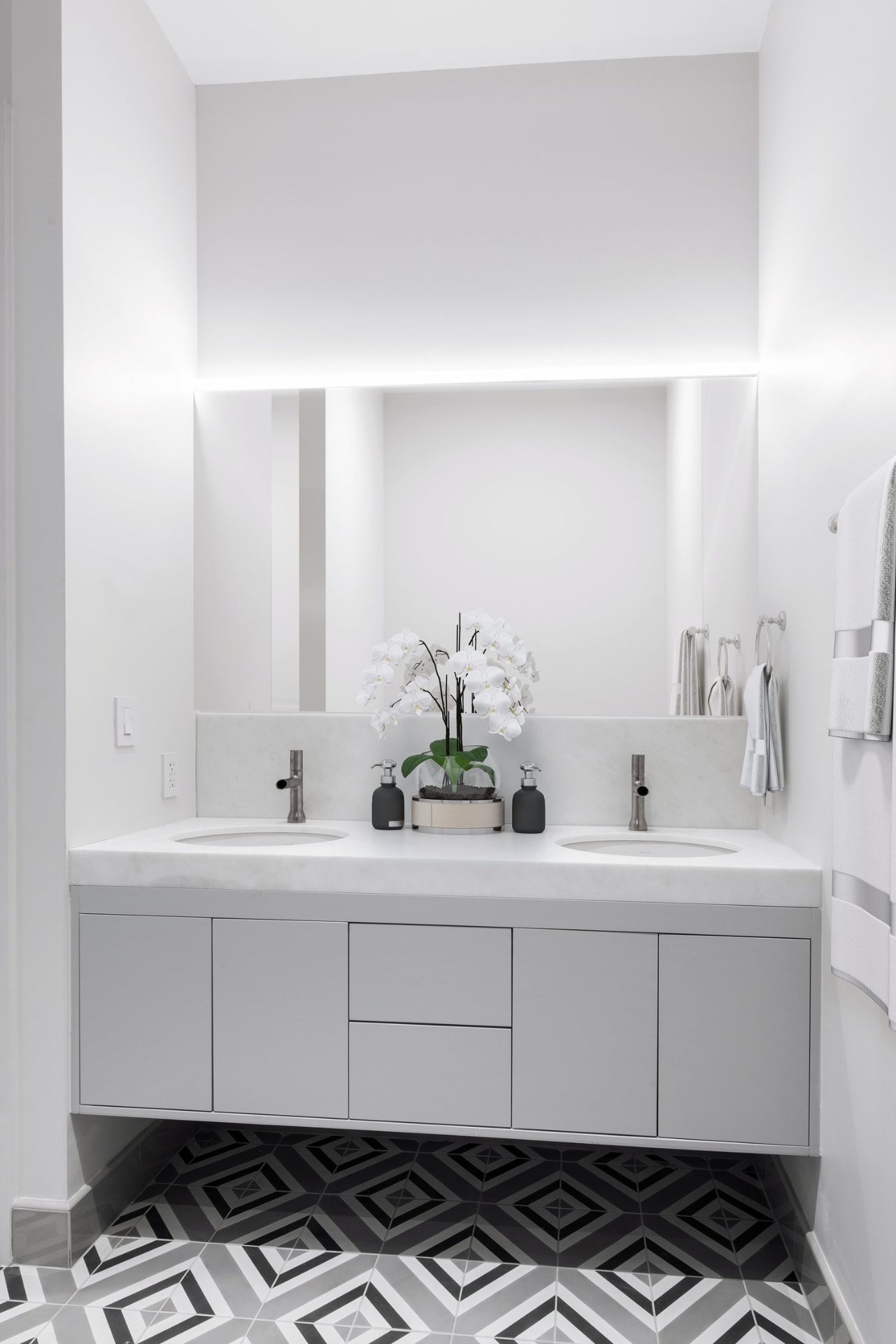Luxury Tribeca residence renovation at 395 Broadway featuring custom millwork, white oak flooring, and refined marble finishes. — image 7 of 10