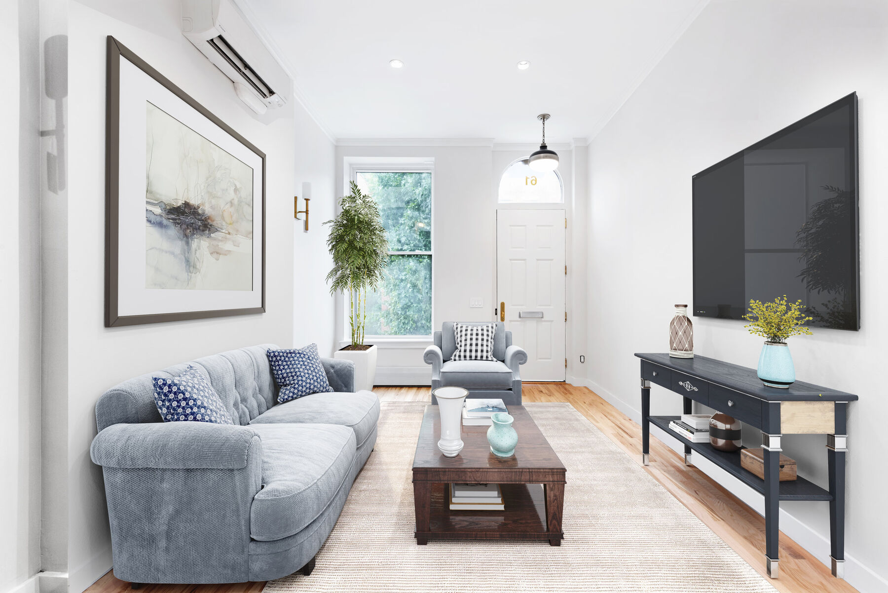 Harlem residence renovation with open living and dining rooms and custom joinery — image 7 of 13