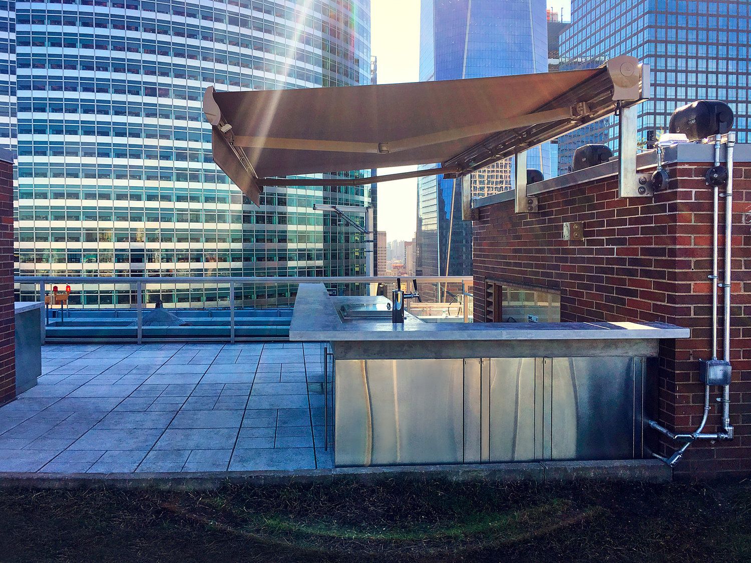 Battery Park City rooftop terrace with built-in seating and city views — image 6 of 6