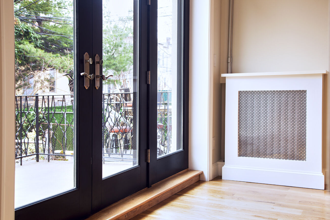 Crown Heights brownstone renovation with restored period detail — image 2 of 5